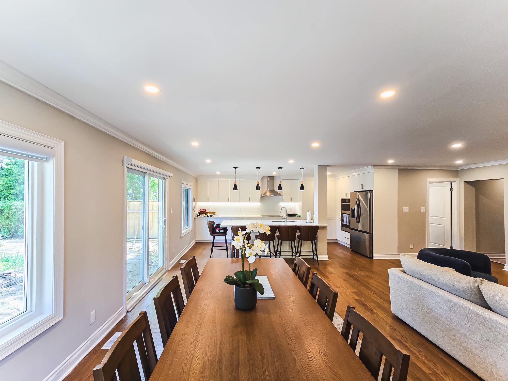 Dining table leading toward the kitchen