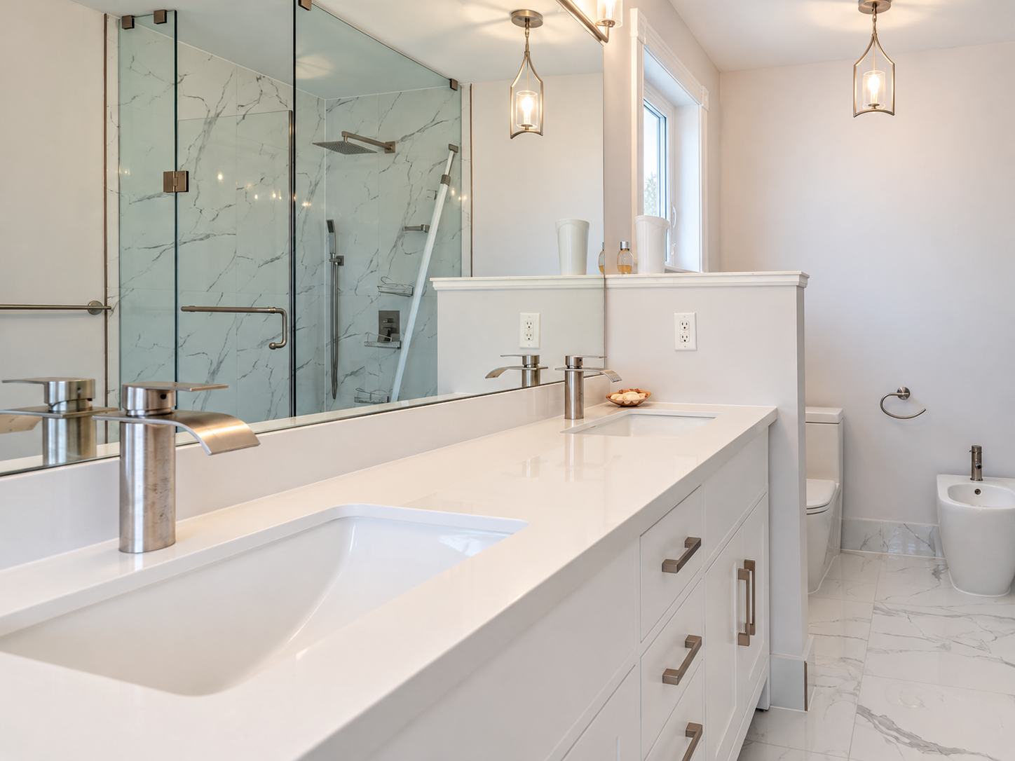 Detail study of the long white vanity, mirror and brushed-nickel fittings