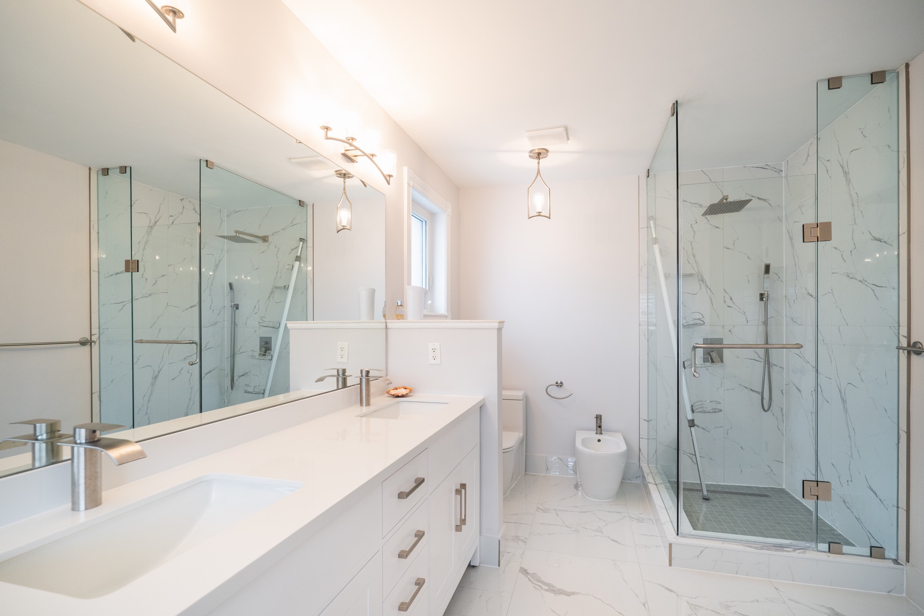 Completed bright ensuite with double vanity and glass shower
